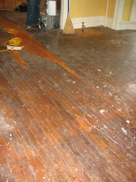 Before refinishing the hardwood floors.